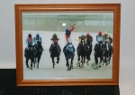 有馬記念引退レース：オグリキャプ号ゴール瞬間写真。左手を挙げた武豊騎手